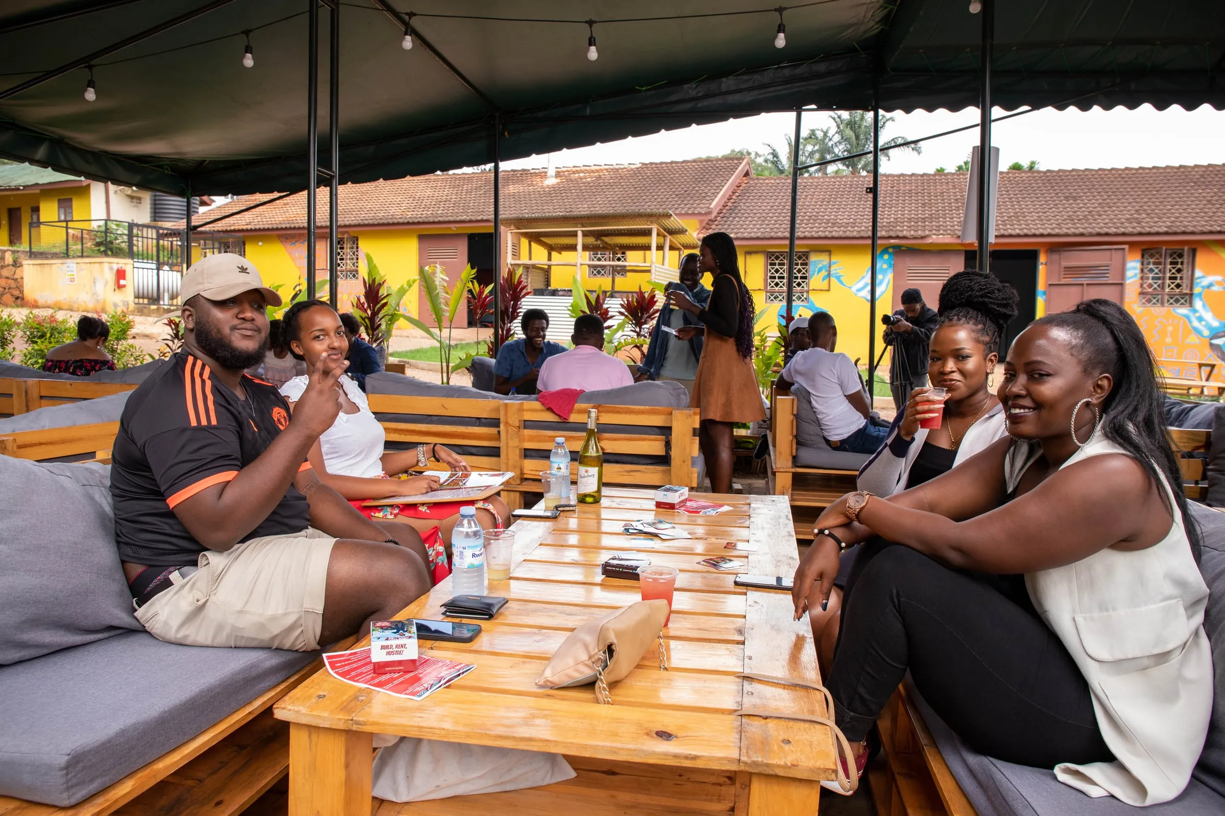A relaxed crowd playing on an outdoor terrace